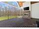 Spacious deck with an outdoor fireplace, offering a perfect setting for entertaining and relaxation at 722 Clegg Farm Dr, York, SC 29745