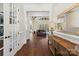 Bright foyer with hardwood floors, console table, and a view into the living room at 722 Clegg Farm Dr, York, SC 29745