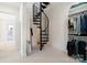 Hallway with a unique spiral staircase and convenient access to a closet for added storage and organization at 722 Clegg Farm Dr, York, SC 29745