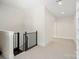 Bright hallway with access to a staircase on one side and a doorway on the other, providing smooth transition at 722 Clegg Farm Dr, York, SC 29745