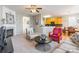 Bright living area with fireplace, open to kitchen and breakfast nook at 7554 Coastal Way, Huntersville, NC 28078