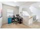 A practical office space featuring a desk, computer, storage, and a staircase at 7554 Coastal Way, Huntersville, NC 28078