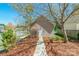 Exterior view of backyard outbuilding with a sidewalk and partial tree coverage at 7554 Coastal Way, Huntersville, NC 28078