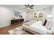 A serene main bedroom featuring plush decor, large windows, and modern design at 8007 Willhill Rd, Mint Hill, NC 28227