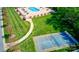 Aerial view of community amenities including pool, tennis court, and meticulously maintained landscaping at 8518 Christalina Ln, Denver, NC 28037