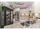 This beautifully updated kitchen boasts stainless steel appliances, granite countertops, and ample cabinet space at 8518 Christalina Ln, Denver, NC 28037