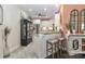 An inviting kitchen features granite countertops, stainless steel appliances, and a stylish breakfast bar with seating at 8518 Christalina Ln, Denver, NC 28037