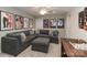 Relax in the living room, decorated with movie posters and equipped with cozy seating at 8518 Christalina Ln, Denver, NC 28037