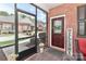 Cozy screened porch with an inviting welcome sign at 8518 Christalina Ln, Denver, NC 28037