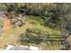 Aerial view of the large backyard and mature landscaping at 916 Rollingwood Dr, Mount Holly, NC 28120