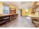 The unfinished basement has lots of potential, and includes a work bench and shelving at 916 Rollingwood Dr, Mount Holly, NC 28120