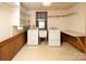 Bright laundry room with washer, dryer and utility sink at 916 Rollingwood Dr, Mount Holly, NC 28120