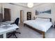 Spacious bedroom with tray ceiling, soft carpet, and mountain-themed artwork at 938 Moose Trl, Matthews, NC 28104