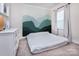 Neutral bedroom with wall art, minimalist decor, and large window at 938 Moose Trl, Matthews, NC 28104
