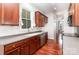 Spacious kitchen boasts sleek countertops, stainless appliances, hardwood floors, and ample cabinet space at 9832 Sunriver Rd, Huntersville, NC 28078