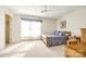 A bedroom with carpet, ceiling fan, furniture, and a window at 106 Jason Ct, Fort Mill, SC 29715