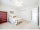 Bright bedroom features neutral carpet, a double closet, and a full-sized bed at 106 Jason Ct, Fort Mill, SC 29715
