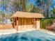 A well-maintained pool house offers changing rooms, adding convenience to the community pool area at 106 Jason Ct, Fort Mill, SC 29715