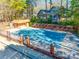 A clean community pool with lush surroundings offers a refreshing escape at 106 Jason Ct, Fort Mill, SC 29715