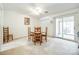 Bright dining area with natural light, ceiling fan, and sliding glass door at 106 Jason Ct, Fort Mill, SC 29715