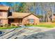 Brick home exterior featuring a well-manicured lawn and plenty of parking at 106 Jason Ct, Fort Mill, SC 29715