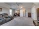 View of large bonus room featuring seating and area for bar and other entertaining features at 10728 Bere Island Dr, Charlotte, NC 28278