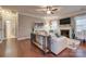 Comfortable living room with hardwood floors, fireplace, and ample seating for guests at 10728 Bere Island Dr, Charlotte, NC 28278