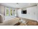 Serene main bedroom featuring built-in storage, bright windows, and neutral decor at 109 Redbird Ln, Weddington, NC 28104
