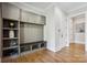 Charming mudroom boasts custom shelving, convenient bench seating, and ample storage for an organized entryway at 109 Redbird Ln, Weddington, NC 28104