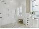 Modern bathroom featuring a spacious glass-enclosed shower, sleek fixtures, and a serene ambiance at 109 Redbird Ln, Weddington, NC 28104