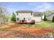 A spacious backyard with a deck and room to relax and entertain at 11415 Serenity Way, Charlotte, NC 28269