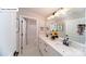 The bathroom features a double vanity, decorative light fixture above the mirror, and a shower/tub combo at 118 Fordingbridge Ln, Mooresville, NC 28115