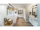 A modern bathroom features beautiful tile floors, stand-up shower, soaking tub, and dual sinks at 118 Fordingbridge Ln, Mooresville, NC 28115