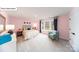 Bright bedroom featuring plush carpet, stylish furnishings, and a sunlit window with a great view at 118 Fordingbridge Ln, Mooresville, NC 28115