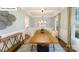 Elegant dining room features a large wood table with seating for eight and stylish modern decorations at 118 Fordingbridge Ln, Mooresville, NC 28115