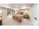 Spacious main bedroom features tray ceiling, large windows, and neutral tones at 118 Fordingbridge Ln, Mooresville, NC 28115