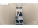 Organized mudroom with storage, hooks, and space for shoes and accessories at 118 Fordingbridge Ln, Mooresville, NC 28115