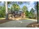 Charming brick home with mature landscaping at 119 Lakenheath Ln, Matthews, NC 28105