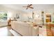 Inviting living room featuring hardwood floors, neutral paint, and a ceiling fan at 119 Lakenheath Ln, Matthews, NC 28105