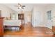 Bedroom features hardwood floors and two doors for convenient access at 119 Lakenheath Ln, Matthews, NC 28105