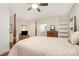Bedroom features hardwood floors, natural light, and an ensuite bathroom at 119 Lakenheath Ln, Matthews, NC 28105