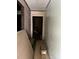 Interior hallway in need of repair with raw walls and floors, awaiting renovation at 119 Mitchell St, Salisbury, NC 28144
