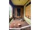 Unfinished porch with raw materials scattered around and walls awaiting restoration at 119 Mitchell St, Salisbury, NC 28144