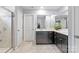 Bathroom boasting double vanity, large mirror, tile flooring, and glass shower stall at 121 Little Kennerly Dr, Mooresville, NC 28115