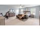 Bedroom showcasing large windows, stylish furniture, and carpet flooring at 121 Little Kennerly Dr, Mooresville, NC 28115