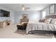 Bedroom showcasing large windows, stylish furniture, and carpet flooring at 121 Little Kennerly Dr, Mooresville, NC 28115