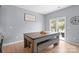 Dining area with modern farmhouse table and view of outdoor space at 121 Little Kennerly Dr, Mooresville, NC 28115