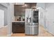 Kitchen features stainless steel refrigerator and dark wood cabinets at 121 Little Kennerly Dr, Mooresville, NC 28115