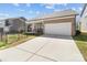 Beautiful two-story home with a two-car garage and manicured lawn at 12110 Anne Blount Aly, Huntersville, NC 28078