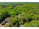 Aerial view showcasing the property's lush greenery and stunning treelined setting at 12627 Ninebark Trl, Charlotte, NC 28278